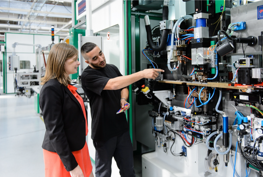Woman and Man Having a Discussion at the Schneider Electric Southern Logistics Center
