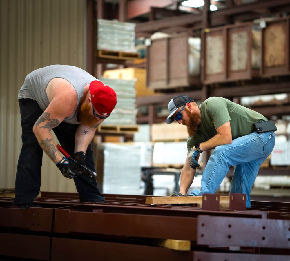 Two Men Working on Steel Construction